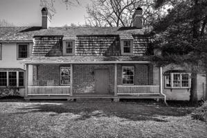 Front of house, 1792, with 19th-century wing to right and recent